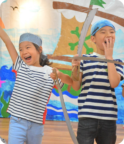 Helen O Grady Drama Academy Two Asian Kids Enjoying the Activity